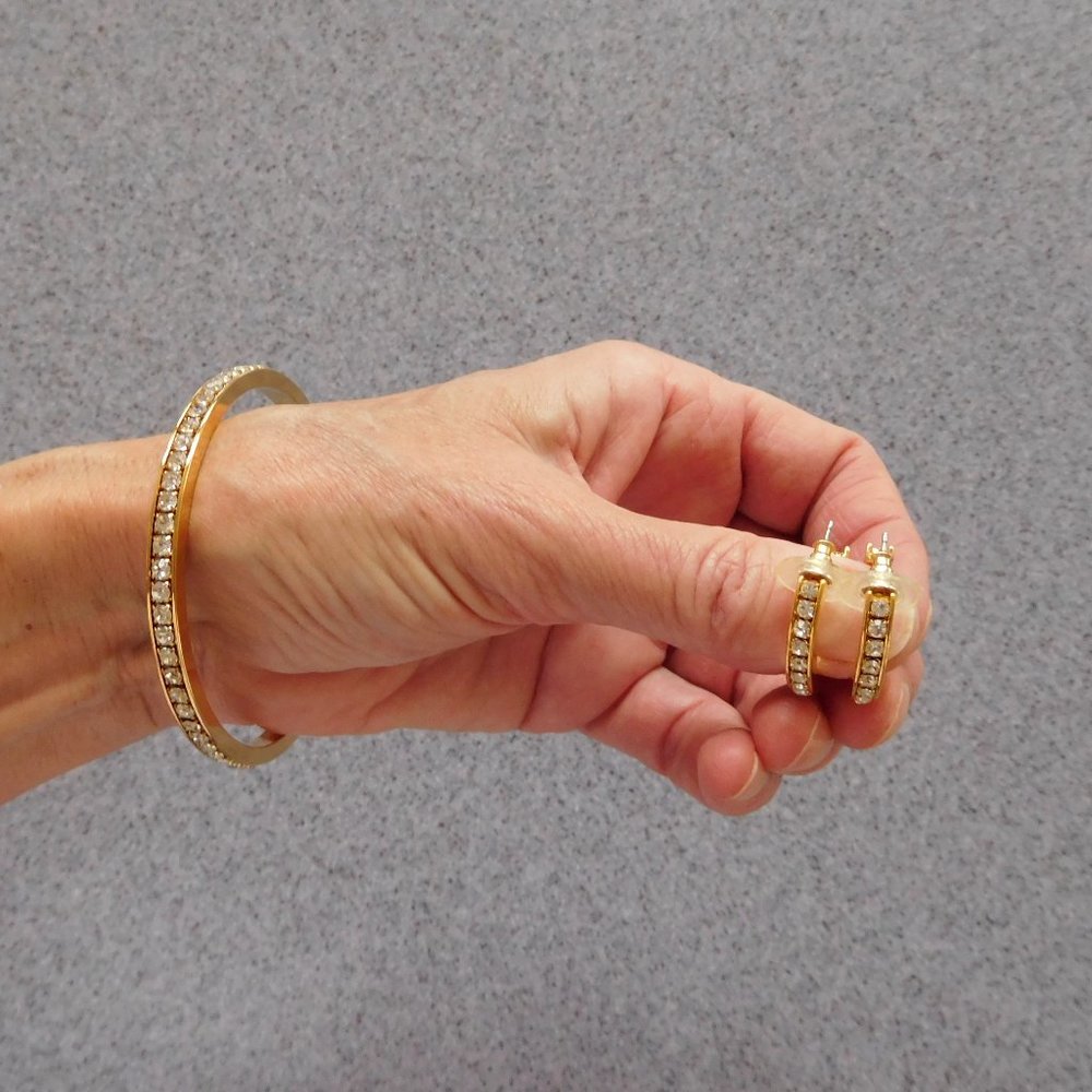 Avon sparkly goldtone bracelet and earrings